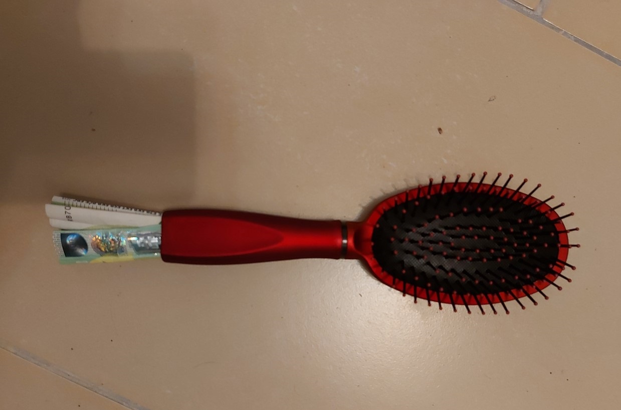 Hideout in hair comb.jpg