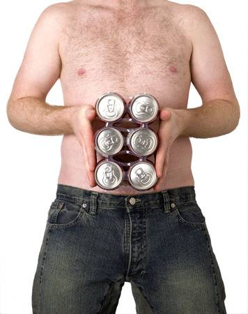 40255222-this-image-shows-a-young-man-holding-a-six-pack-of-beer-over-his-belly-.jpg